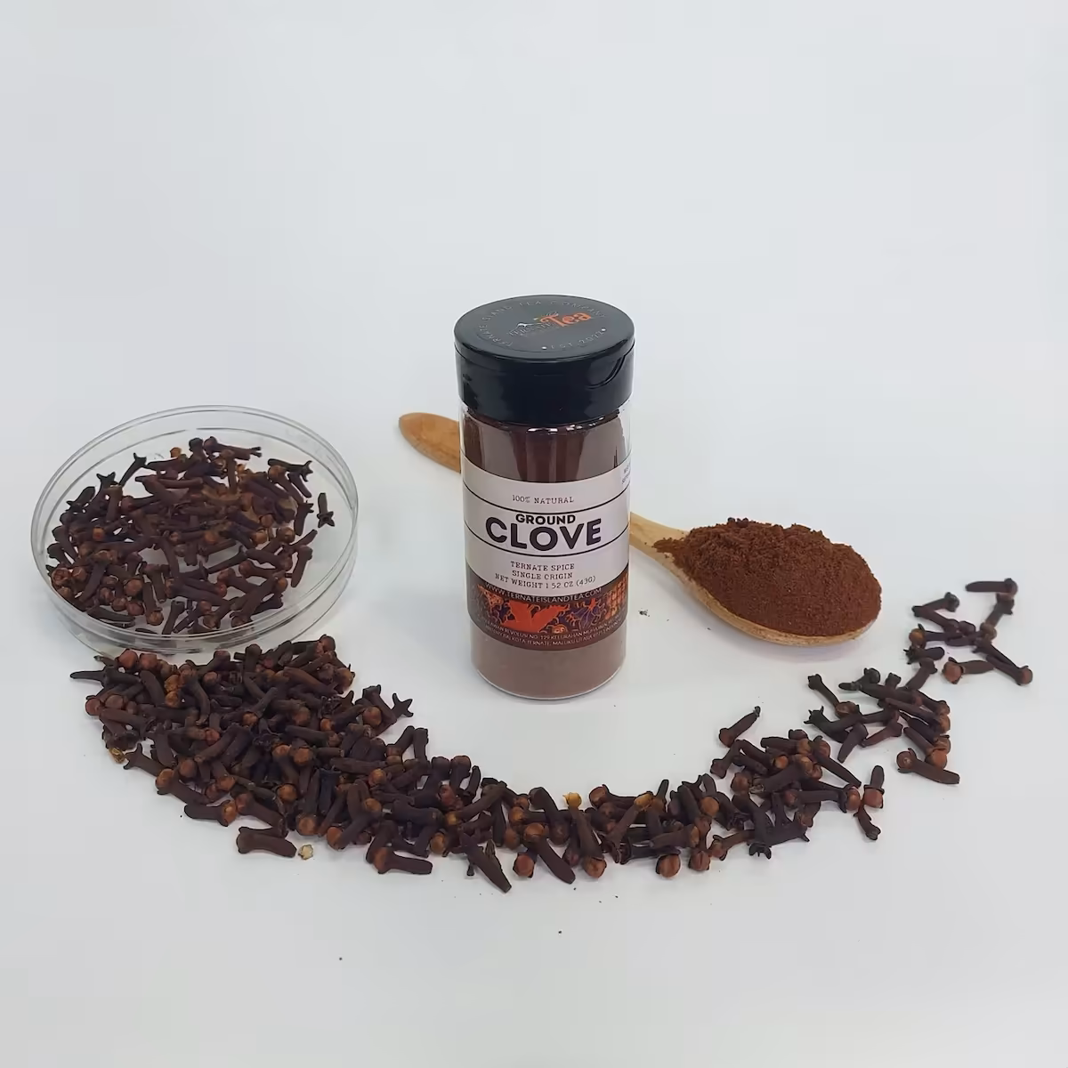 A spice bottle of Whole Clove with a sleek label reading ‘Ternate Spice, Single Origin,’ displayed on a bed of whole cloves.